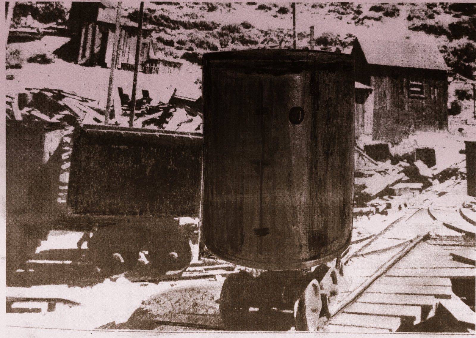Have you an original photo of the gun turret below owned by United States Mining & Refining? — .....the gun turret set on a narrow gauge circular track, complete with bullet marks and dents. — By pulling or pushing a vertical lever, we could go forward or backwards, it could travel fairly fast,